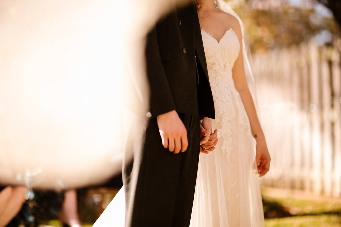 Cody Kurtz Photo. Wedding Gown and Suit